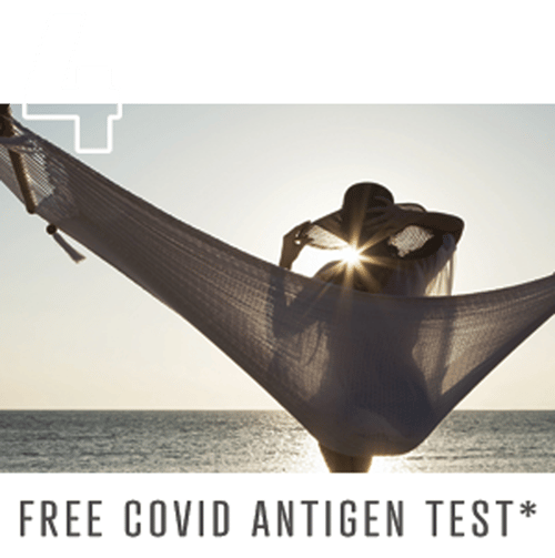 Woman in hammock carefree after Free covid antigen test 